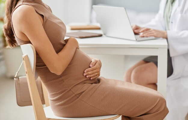 How to Sit and Stand During Pregnancy: Essential Posture Tips